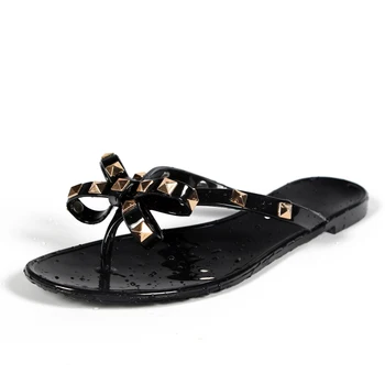 Quente 2020 Moda Mulher Flip-Flops Sapatos de Verão Fresco Praia Rebites grande arco sandálias de Marca de sandálias jelly shoes meninas tamanho 36-42